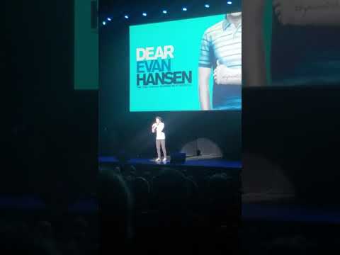 Colton Ryan Waving Through a Window