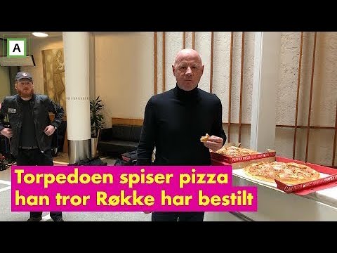 Her spiser torpedoen pizza han tror Kjell Inge Røkke har bestilt