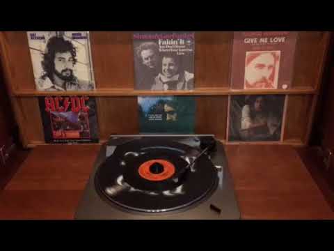 Simon & Garfunkel, "Fakin' It".  1970