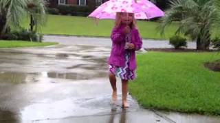 Rainy day fun Melanie singing in the rain
