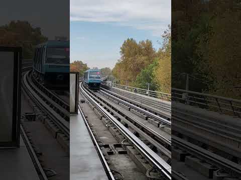 Metro de Santiago Línea 5 (NS93) saliendo de Estación Monte Tabor