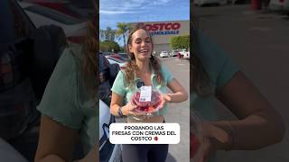 Probando las fresas con crema del Cotsco ??