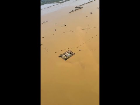 Family’s DIY Levees Save Their Home From Historic Flooding
