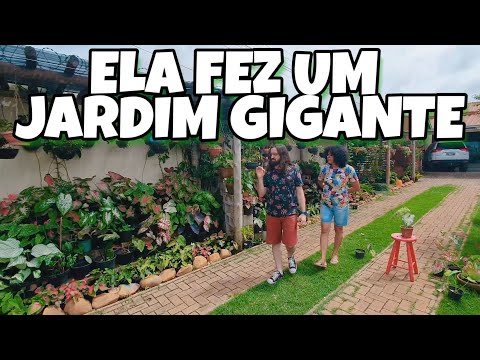 GIANT GARDEN - She lives surrounded by succulent plants and Caladium