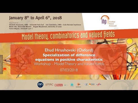 Specialization of difference equations in positive characteristic