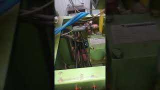 unscrewing the screws with the help of a chain hoist