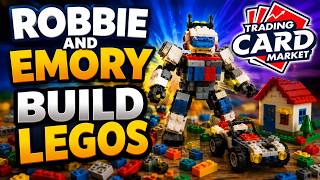 Robbie and Emory build legos and duplo sets