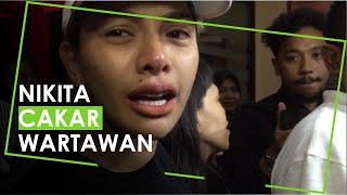 Sempat Berdiam Diri di Mobil Selama 30 Menit, Nikita Mirzani Cakar Wartawan saat Tiba di Mapolda