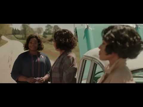 Hidden Figures trailer frame of chalkboards and Katherine calculating, reflecting the score’s piano-ostinato idea
