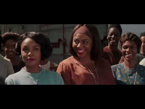 Hidden Figures official trailer still with Katherine, Dorothy, and Mary walking toward the NASA campus