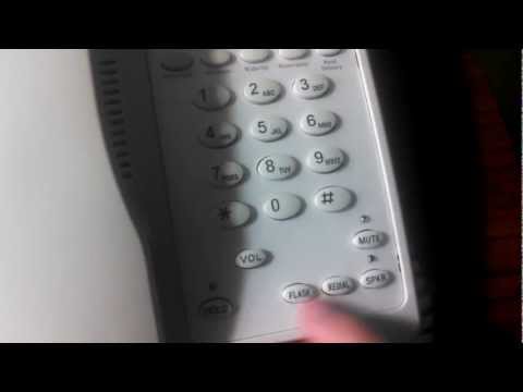 Black & ivory plastic hotel room phone, model number: ha8999...