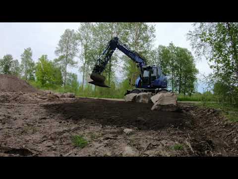 Fixar till en trädgård och bygger stenmur/working on a lawn building a rockwall