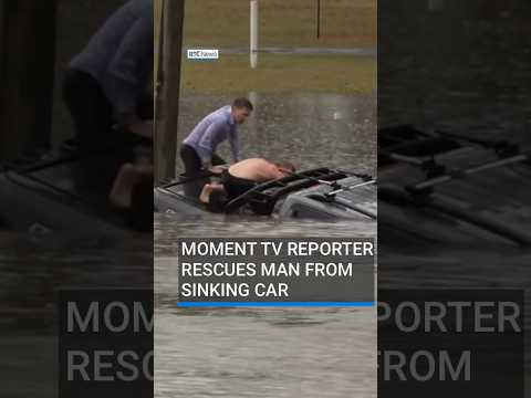 Moment Australian TV reporter rescues man from sinking car during floods #RTÉNews