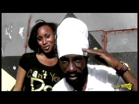 SIZZLA feat  DIANA RUTHERFORD - A NEW DAY    OFFICIAL MUSIC VIDEO