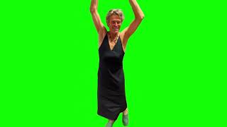 Willem Dafoe dancing in a dress green screen