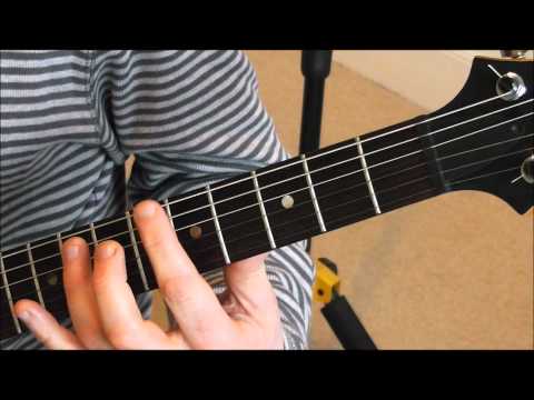 Tuning A Guitar Using Natural Harmonics