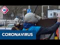 Glazenwassers beschermen zich tegen virus tijdens werk