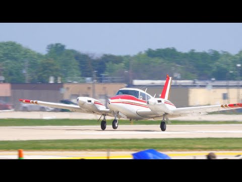 Piper Twin Comanche landing at AirVenture 2021