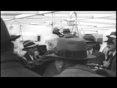 Irish playwright George Bernard Shaw with officials disembark from a vessel at a ...HD Stock Footage