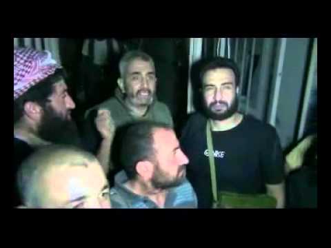 عناصر كتائب الفاروق داخل المشفى الوطني في القصير بعد السيطرة عليه من قوات النظام