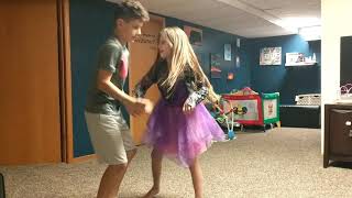 Britt and Aiden dancing to perfect harmony.