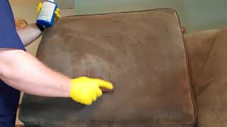 Upholstery cleaning of a dirty microfiber couch.