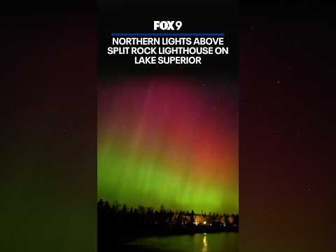 Northern lights visible above Split Rock Lighthouse on Lake Superior