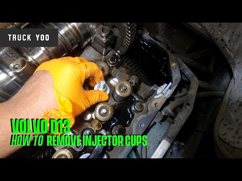Volvo D13 Semi truck. How to remove Injector Cups.