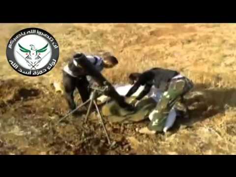 تجهيز مدفع الهاون من قبل عناصر لواء حمزة أسد الله لضرب اللواء 15 في محافظة درعا