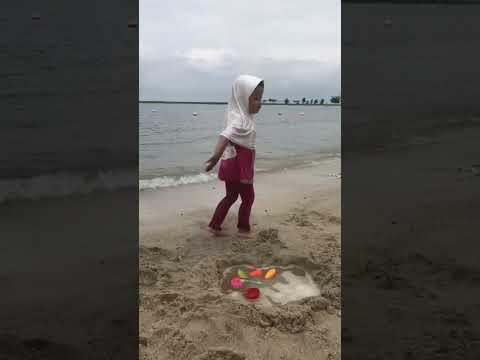 Playing in the Sand on the Beach