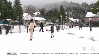 People take in the snow up in Julian with recent storm