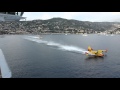 Water Bombers load up next to cruise liner