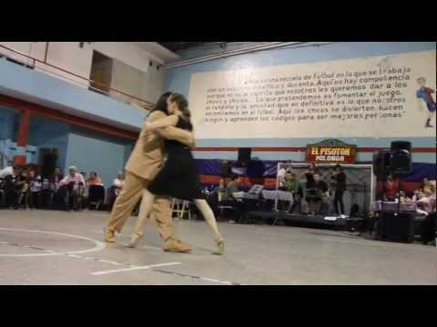  Nany Peralta  and  Rebecca O'Laoire  are  dancing  to  the  tango  "  Oigo Tu Voz  "