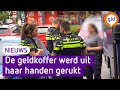 Man berooft medewerkster waardetransportauto in Nijmegen