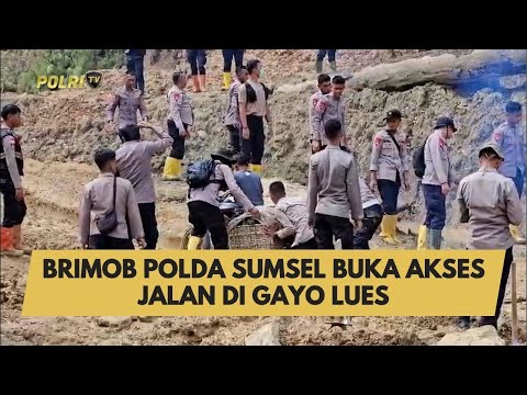 BRIMOB POLDA SUMSEL BUKA AKSES JALAN DI GAYO LUES