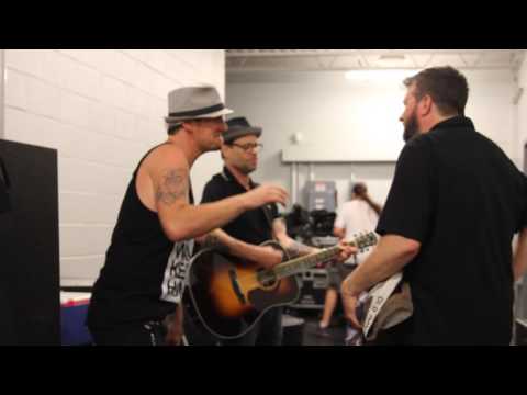 Christopher of Boxkar singing with Robin from Gin Blossoms backstage!