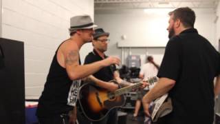 Christopher of Boxkar singing with Robin from Gin Blossoms backstage!
