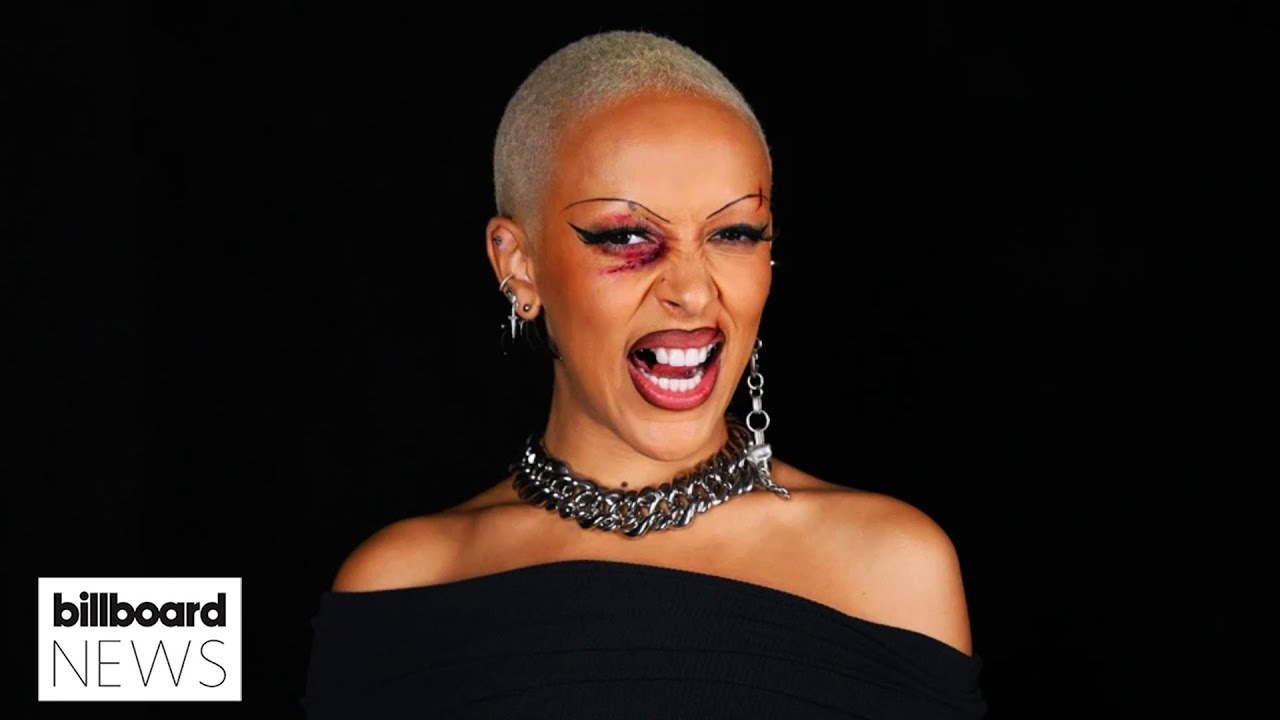 Doja Cat Explains Black Eye & Busted Lip Look at Paris Fashion Week | Billboard News