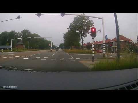 Auto met veel haast, door rood . Gronausestraat Glanerbrug / Enschede