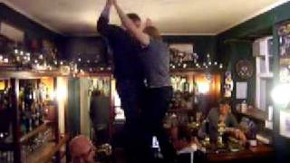 marby and archie dancin on the bar
