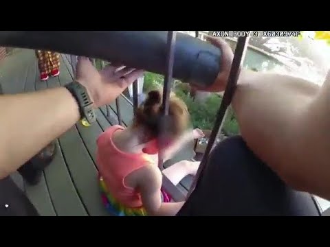 Colorado police officers use battering ram to rescue toddler stuck in railing