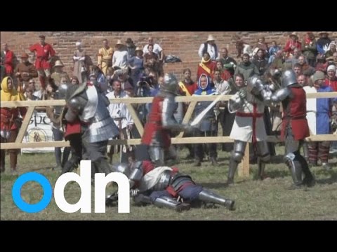 Knights don armour for Medieval Fighting World Championships