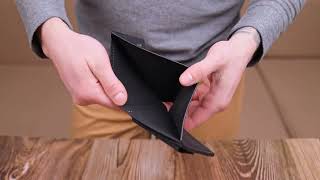 Добротне шкіряне портмоне з вінтажної шкіри в дві додавання Слава ЗСУ Grande Pelle 16734 чорний