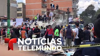 Piden silencio para escuchar sobrevivientes bajo los escombros | Noticias Telemundo