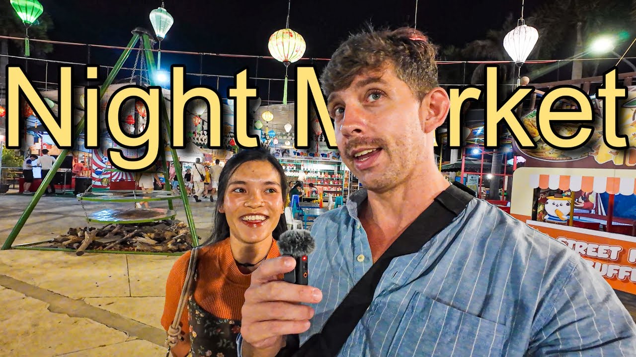 Tourists explore the bustling Helio Night Market in Da Nang, enjoying its lively atmosphere and vibrant stalls.