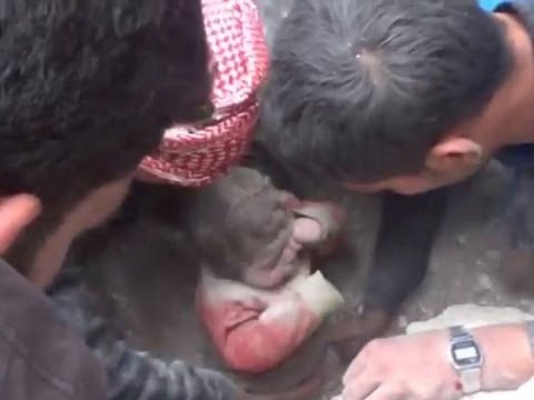 Amazing miracle: Syrian toddler pulled alive from rubble after Aleppo bombing.