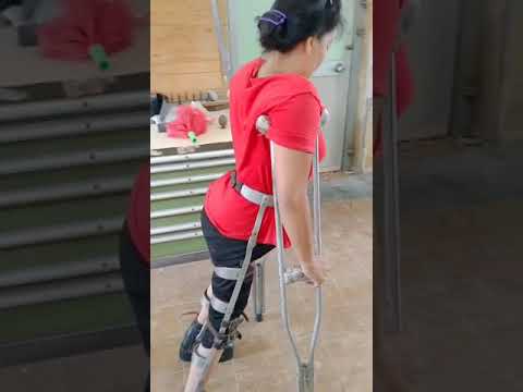 Swing with calipers and crutches