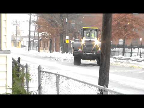 Front End Loader Cleaning the sidewalk on Essax Street Lynn MA