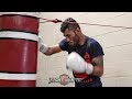 ANDREW CANCIO SMASHING THE HEAVY BAG WITH BODY COMBOS AHEAD OF WORLD TITLE DEFENSE