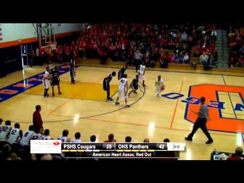 Miles Simelton drains a three pointer with a Plainfield defender in his face